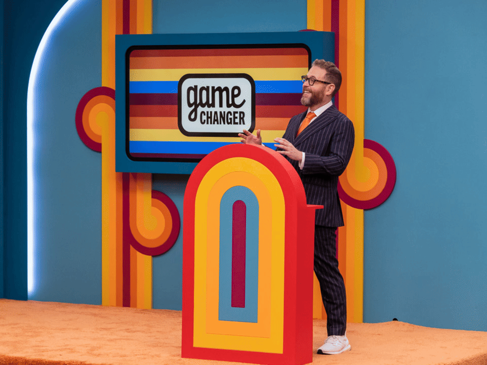 Are you ready for a MOVIE NIGHT, with movie night alternating colors in the Dropout game changer show logo, and Sam Reich at the Game Changer podium in the background.